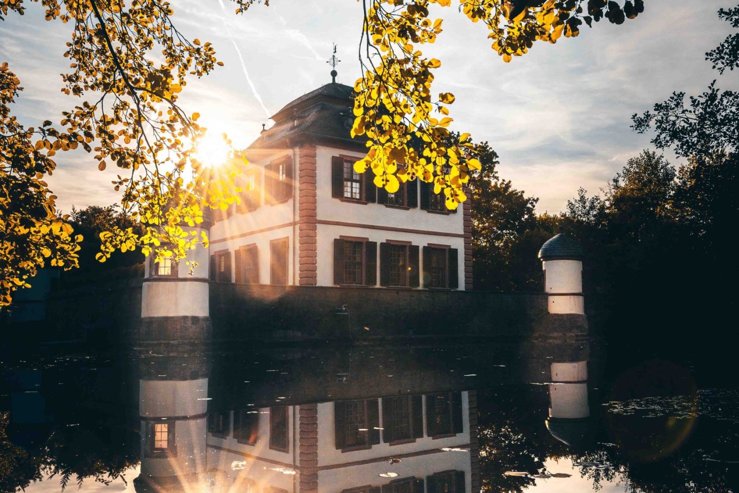 Photo in the sunset, at the lake near Wasserburg moated castle in Seligenstadt, Germany. Landscape photo in the sunset, at the lake near Wasserburg moated castle in Seligenstadt, Germany.